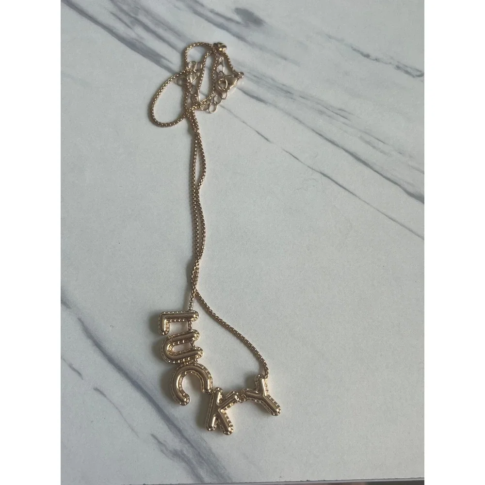 Kate Spade Gold Tone 